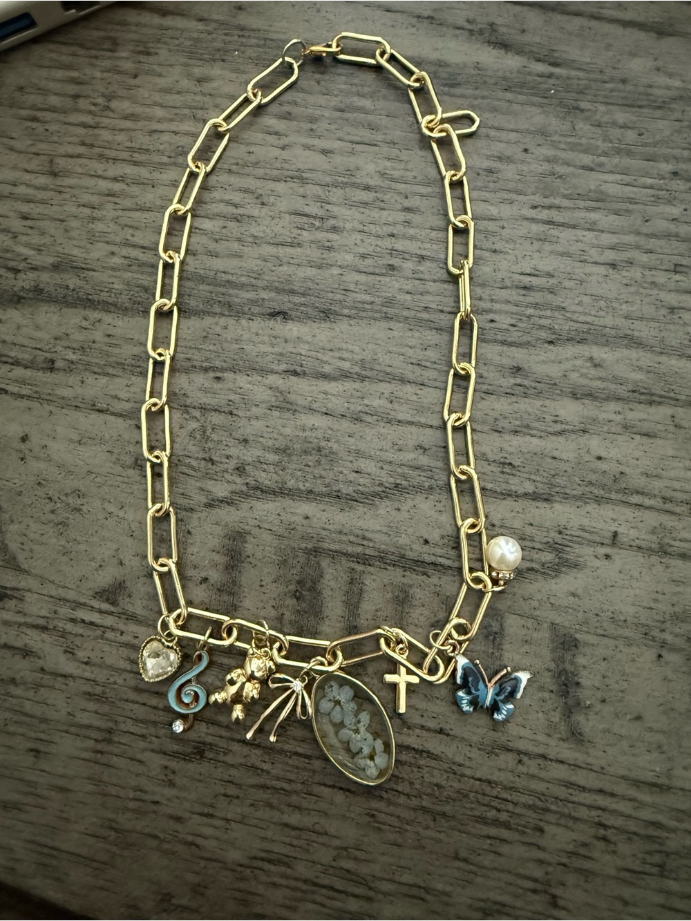 Gold-Tone Charm Pendant Necklace with Blue Butterfly and Pearl Accent
